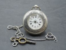 A white metal key wound half hunter pocket watch of small form stamped fine silver having Roman