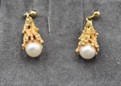 A pair of 9ct gold stud earrings having waterfall drops with cultured pearl terminals, approx 5.8g