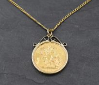 A 1974 gold sovereign in a 9ct gold removable pendant mount on a yellow metal chain stamped 9ct,