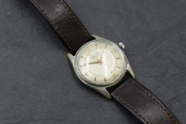 A gent's vintage wrist watch by Baume having Arabic and baton numeral dial on circular face in steel