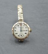 A vintage 9ct rose gold wrist watch having Roman numeral dial with subsidiary seconds to white