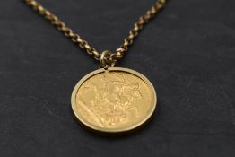 A gold sovereign dated 1902 in a removable 9ct gold pendant mount on a yellow metal belcher chain,