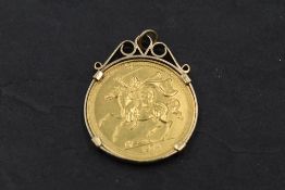 An Isle of Man £2 gold coin dated 1974, in a yellow metal removable pendant mount, approx 20g