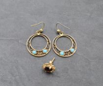 A pair of yellow metal drop loop earrings of circular form having turquoise decoration, and a single