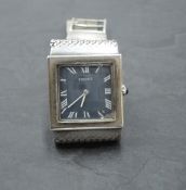 A gent's 1970's silver dress watch by Tissot having Roman numeral dial to square blue face with