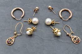 A selection of 9ct gold and yellow metal earrings including cultured and simulated pearl,hoop,