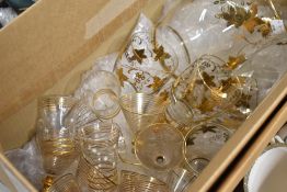 A selection of gilt decorated cocktail glasses including tumbler and decanter set