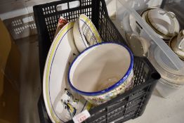 A collection of kitchen platters and servers,also a planter including European styles.