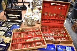 A cased set of brass cut cutlery by Thai Bronze