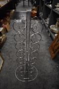 A modern chrome framed bottle or wine rack