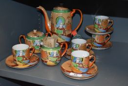 A Japanese porcelain part tea service by Samurai china