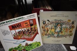 A case of vinyl records and albums including Moody blues