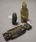 Three ethnic carved stone figures or deities in various designs