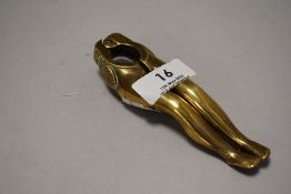 A pair of 20th century nut crackers in the form of ladies legs