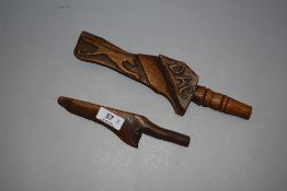Two antique carved distaffs.