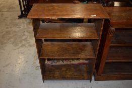 An early 20th Century oak low bookshelf