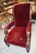 A 19th Century heavy mahogany framed easy chair