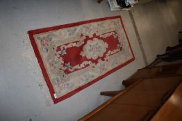 A Chinese fireside rug, approx. 120 x 60cm