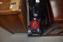 A modern Dyson DC33 vacuum cleaner