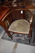 An early 20th Century stained frame salon armchair