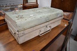 A vintage small size metal travel trunk or case