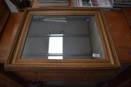 A gilt and gesso framed antique hall way mirror