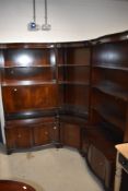 A set of reproduction Regency bookcases/wall units including corner section