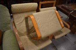 Two modern easy chairs and footstool