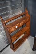 A traditional pine wall shelf