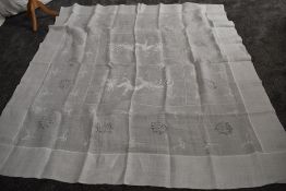 An antique pina cloth/bed coverlet having dragons to centre approx 95' by 78'.