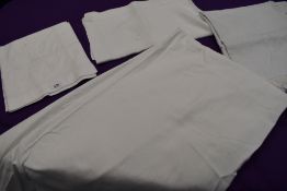 Three antique tables cloths including damask and embroidered examples, also a small throw or cover
