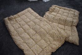 Two 1930s paisley single eiderdowns.