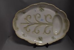 A modern Blackeney turkey plate, with moulded channels and well, 48cm
