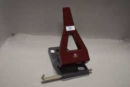 A vintage Rexel Maxi desk top office paper puncher