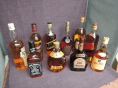 Ten bottles of Blended Whisky, Brandy and Cognac, Johnnie Walker Red Label 43% vol 1L, Johnnie