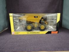 A Norscot 1:50 scale diecast, Cat 793D Mining Truck, in original window box 55174