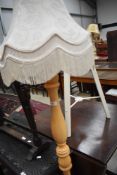 A modern beech standard lamp