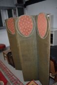 A folding modesty screen/room divider (four section)