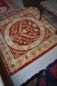 A traditional rug, approx. 140 x 135cm