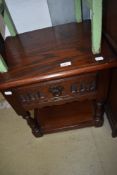An oak Priory style (Wood Bros) occasional low table with drawer, width approx. 46cm