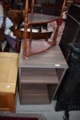 A laminate open fronted cabinet and reproduction wall shelf