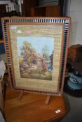 A vintage firescreen having pictorial panel
