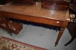 A Victorian mahogany school desk having interesting (but slightly purile) graffiti throughout.