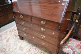 A 19th Century mahogany bureau in the Georgian style having fitted interior , two over three