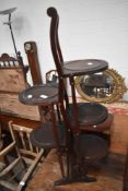 An early 20th Century mahogany folding cake stand