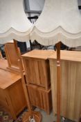A pair of vintage golden oak standard lamps