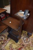 A vintage smokers stand