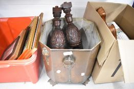 A copper coal bucket and two oak supports