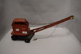 A mid century Tri-ang toy crane.