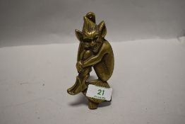 A Cornish Pisky brass door knocker.